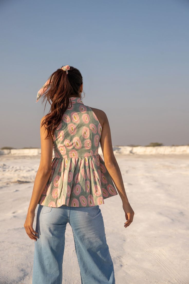 Sleeveless peplum top