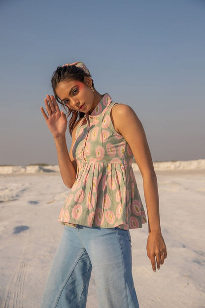 Sleeveless peplum top